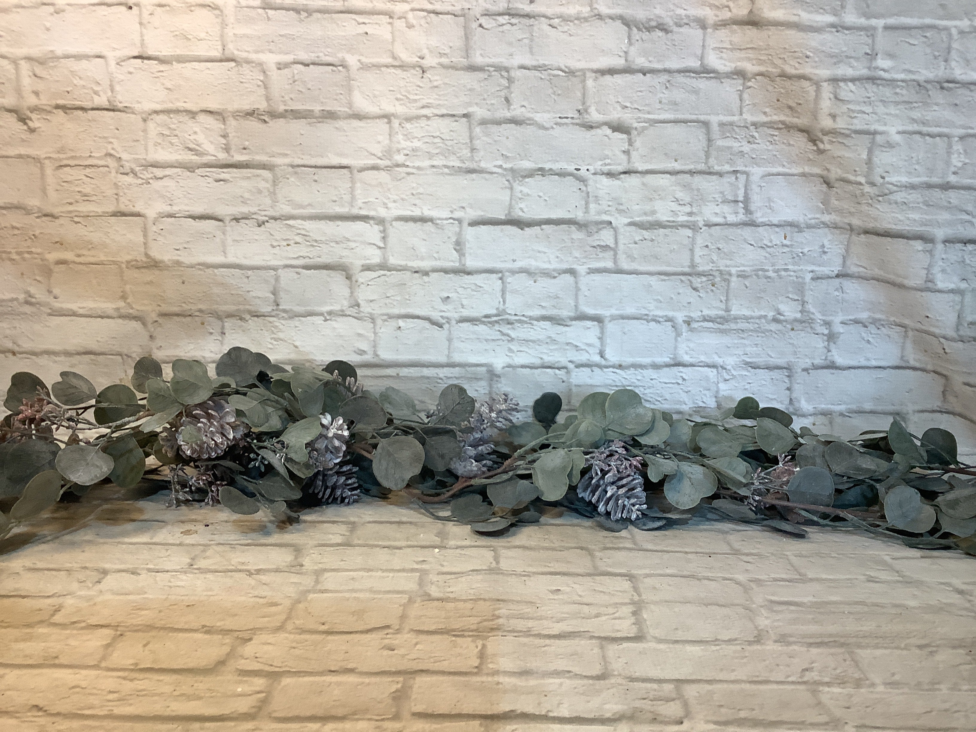 K 70” Eucalyptus and pine cone garland