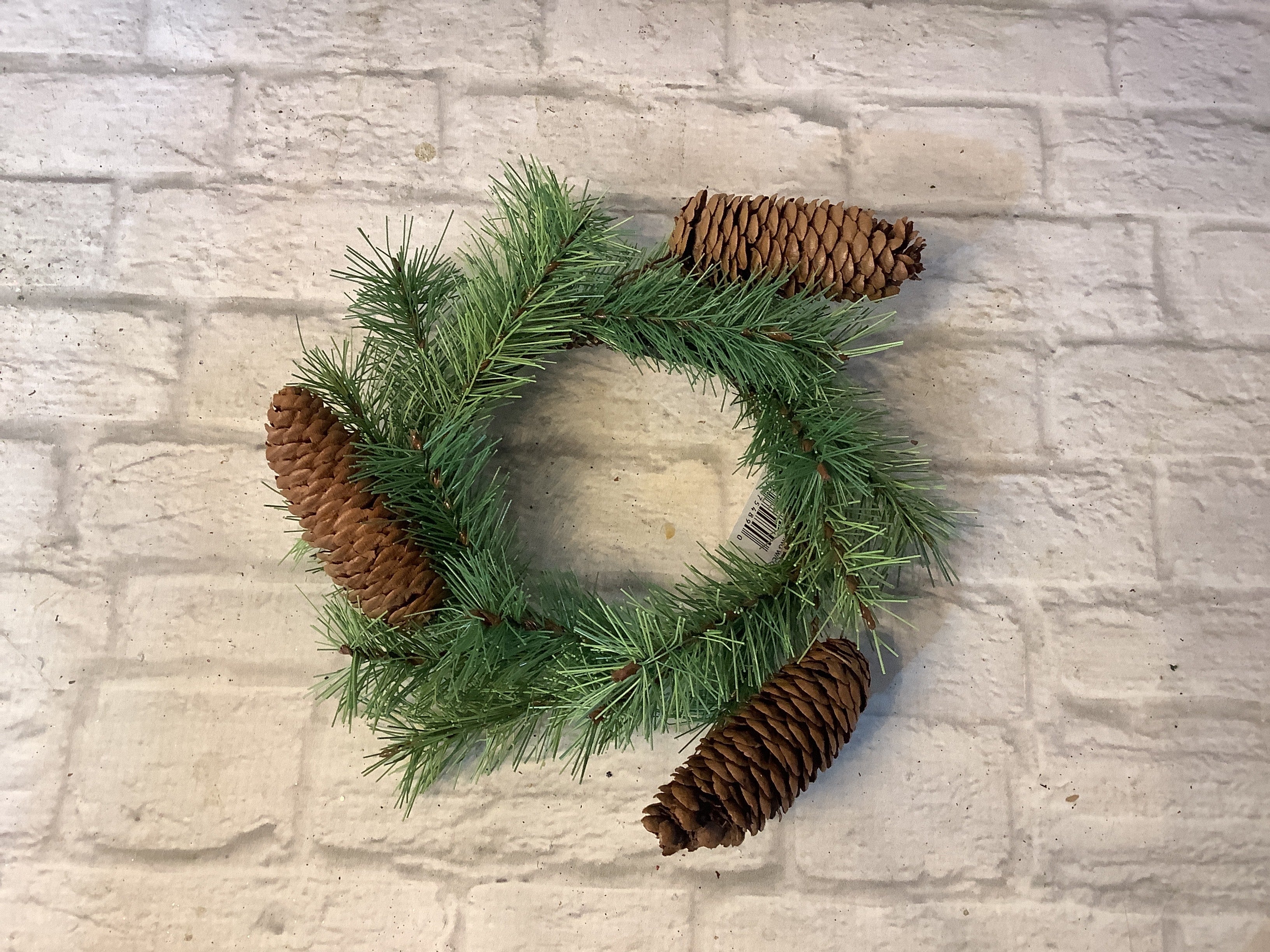 K 10” rocky pine cone candle