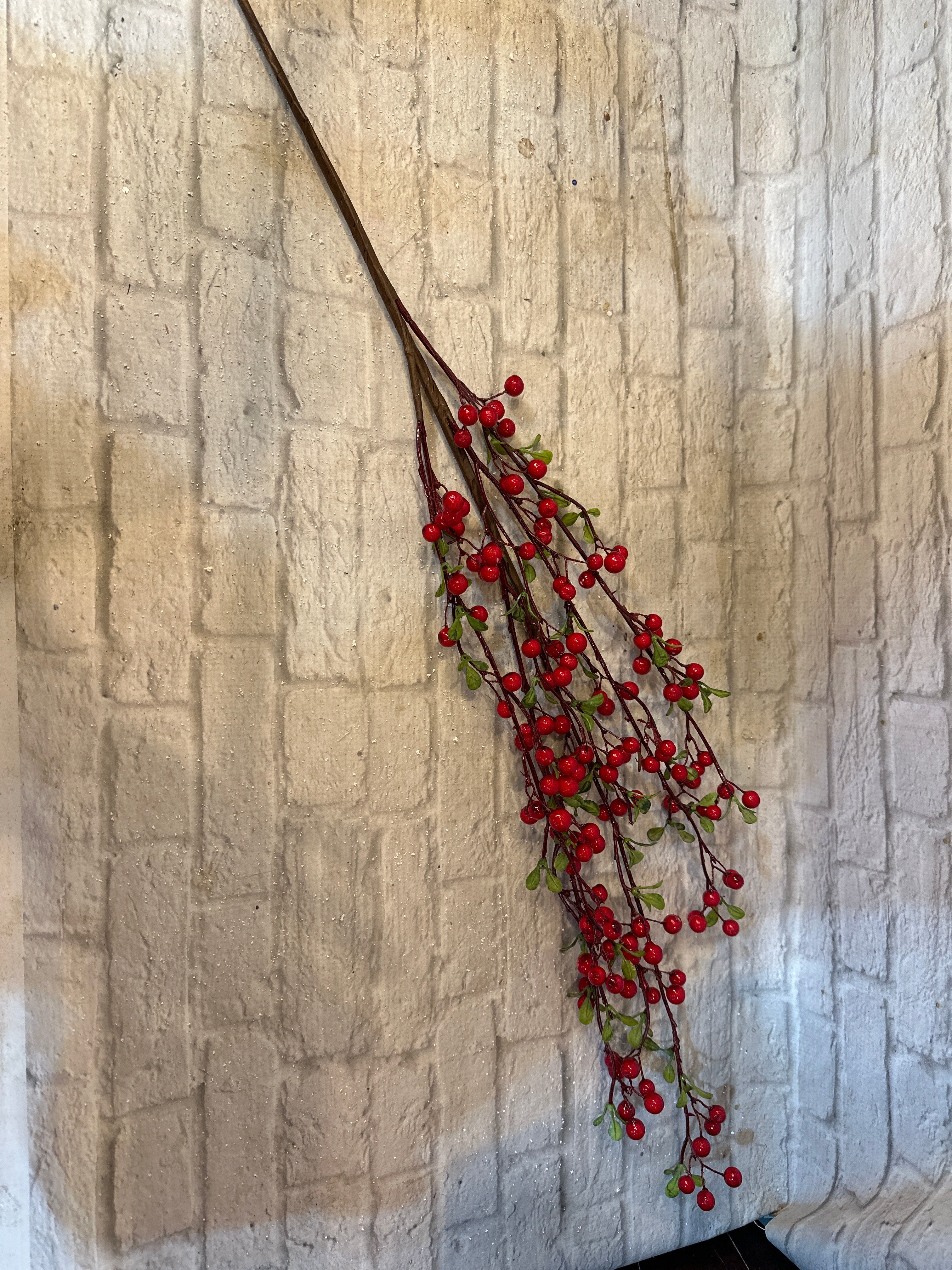 K Red berry spray with greenery